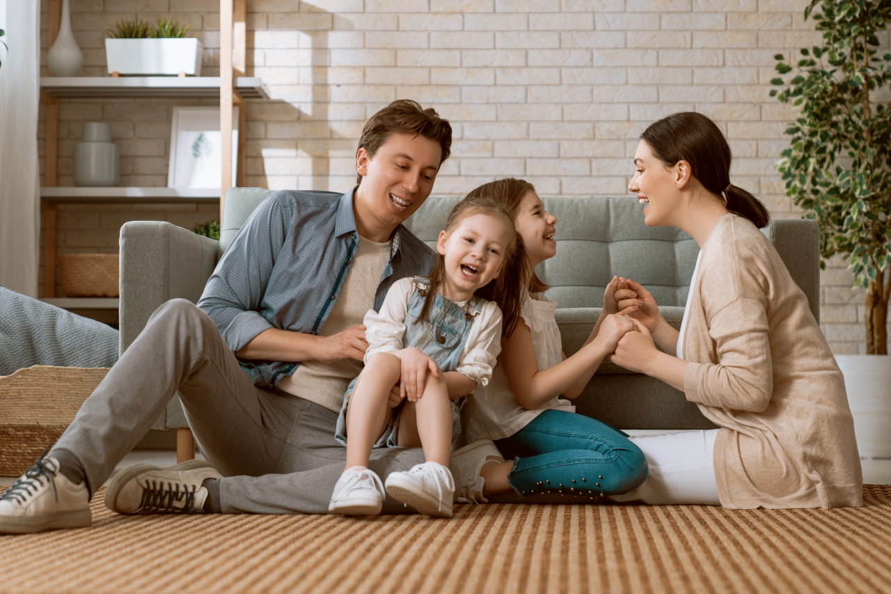 A family enjoying time together on freshly cleaned carpet