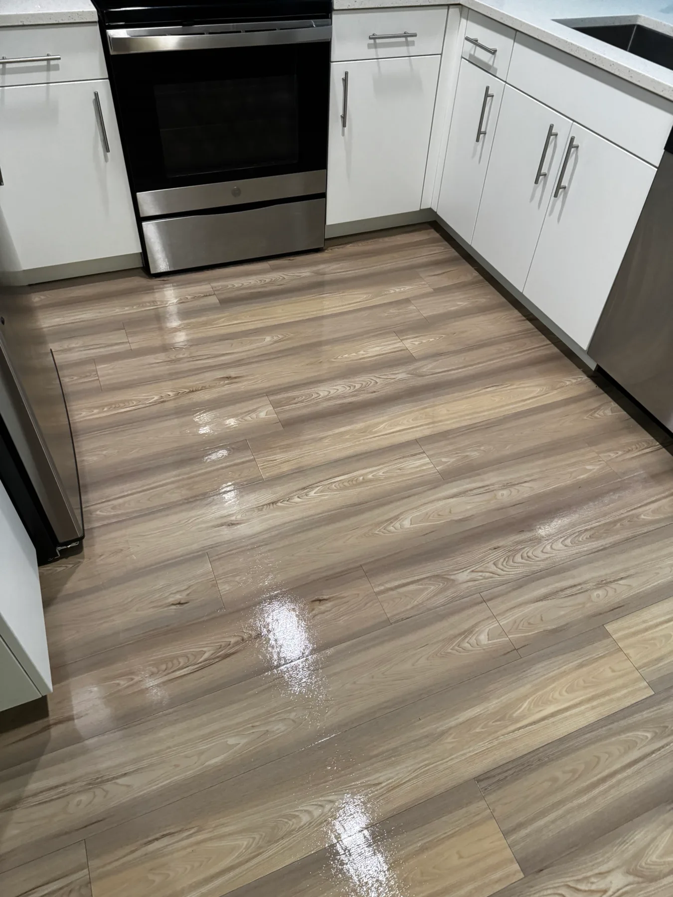 Wood-look vinyl kitchen floor after cleaning